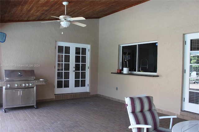 view of patio / terrace with french doors, ceiling fan, and area for grilling