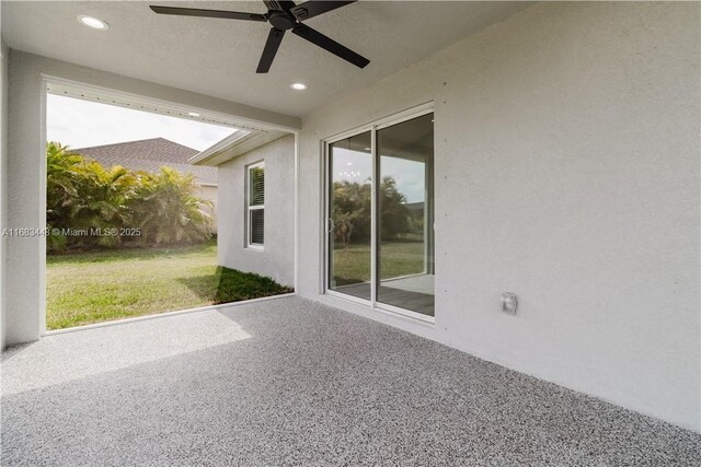 view of patio with ceiling fan