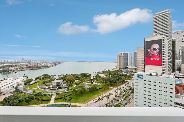 balcony featuring a water view