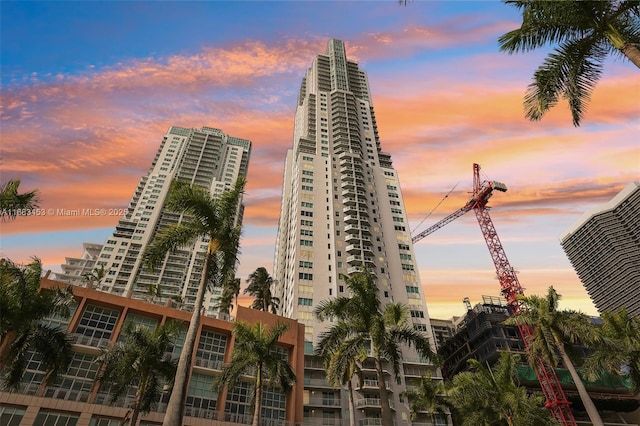 view of outdoor building at dusk