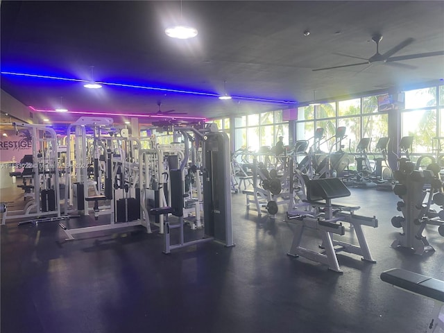 exercise room with ceiling fan