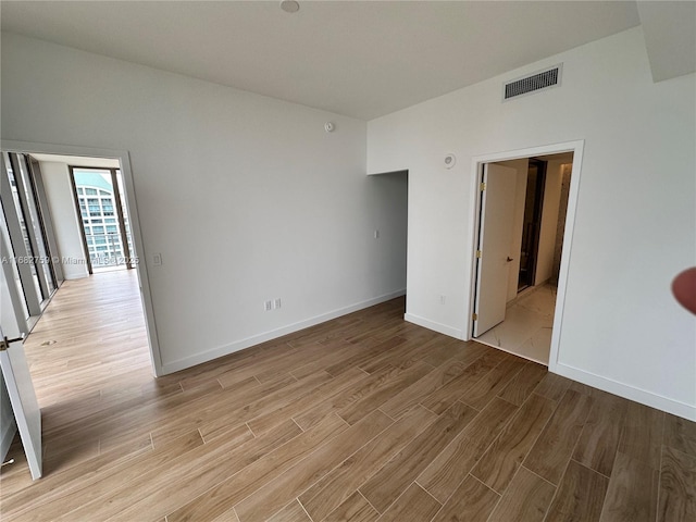 unfurnished bedroom featuring light hardwood / wood-style flooring