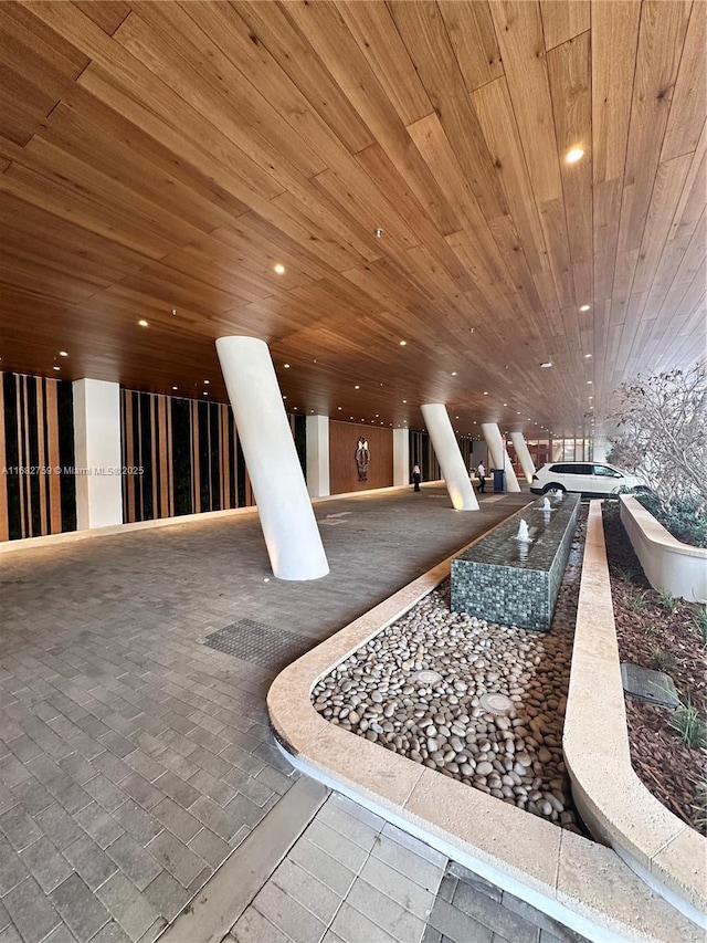 game room featuring wooden ceiling