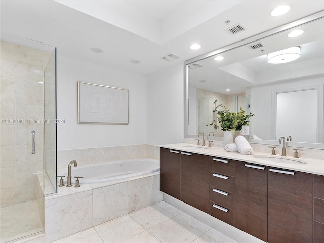 bathroom with vanity, plus walk in shower, and tile patterned floors