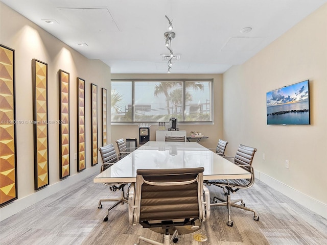 dining space featuring light wood-type flooring