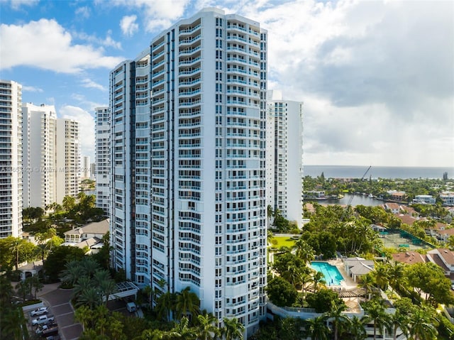 view of building exterior with a water view