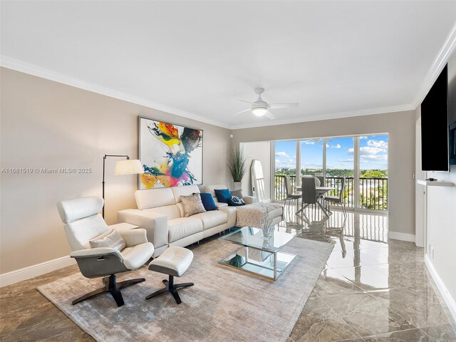 living room with ceiling fan and ornamental molding