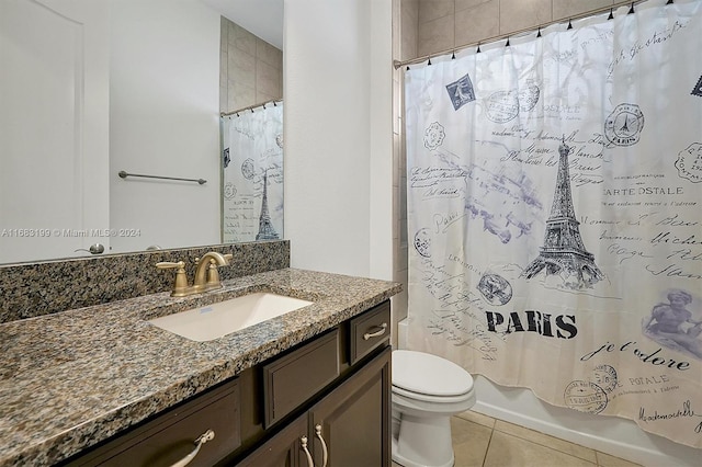 full bathroom featuring vanity, shower / tub combo with curtain, toilet, and tile patterned flooring