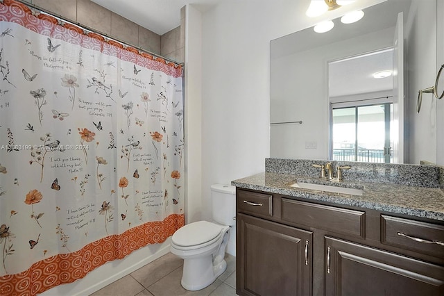 full bathroom with toilet, shower / bath combo, vanity, and tile patterned floors