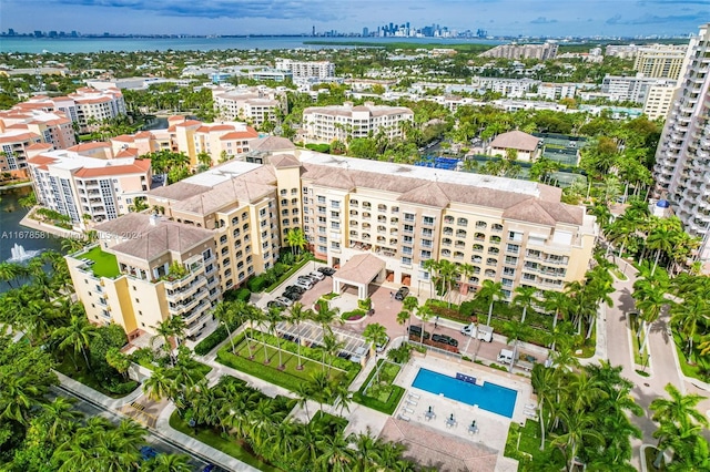 birds eye view of property featuring a water view