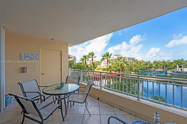 balcony featuring a water view