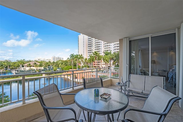 balcony featuring a water view