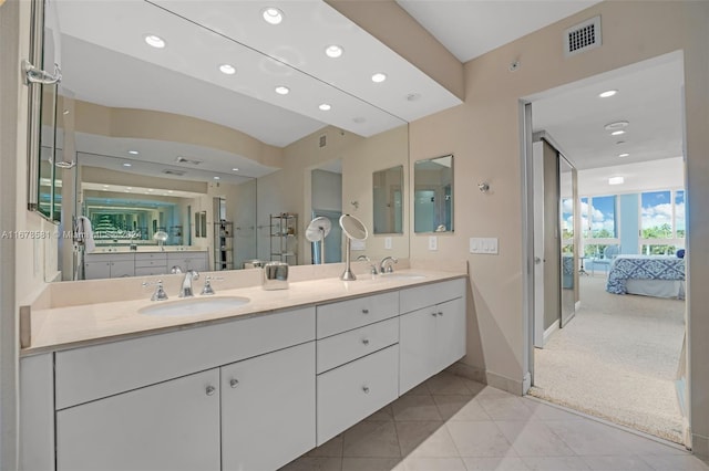 bathroom featuring vanity and walk in shower