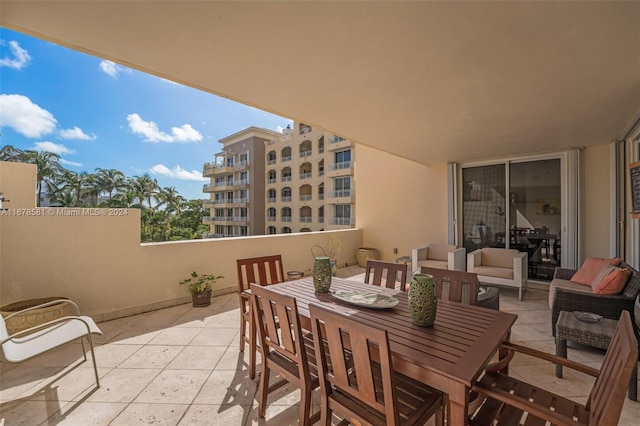 view of patio / terrace with a balcony