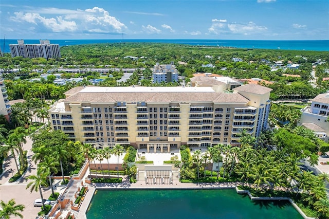 birds eye view of property featuring a water view