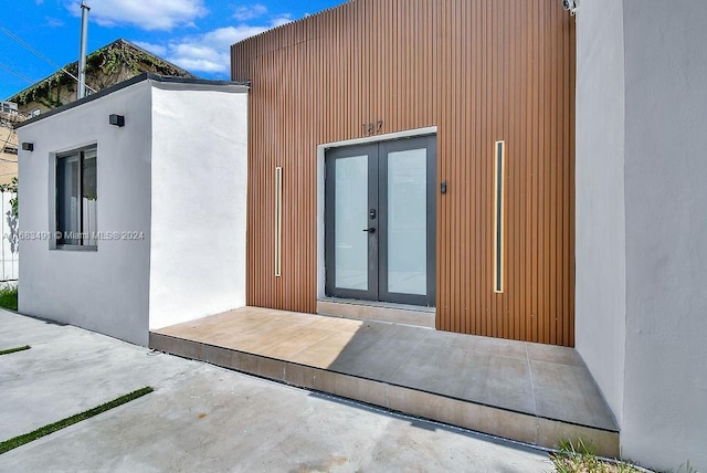 doorway to property featuring french doors