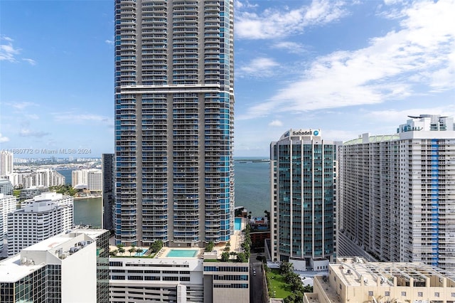 property's view of city featuring a water view