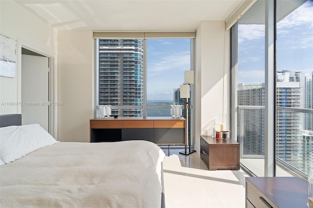 bedroom with a wall of windows