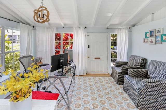 living room with beam ceiling