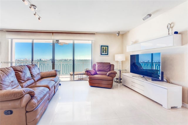 tiled living room with plenty of natural light