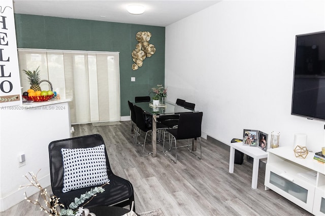 dining area with wood-type flooring