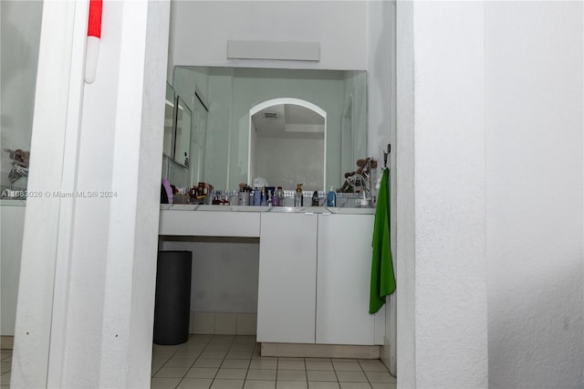 bathroom with vanity and tile patterned flooring