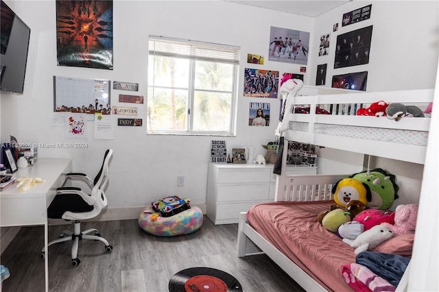 bedroom featuring hardwood / wood-style floors