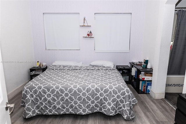 bedroom featuring hardwood / wood-style flooring