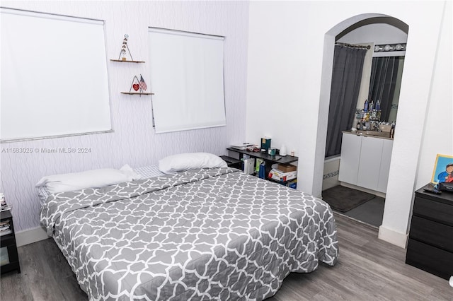 bedroom featuring hardwood / wood-style floors