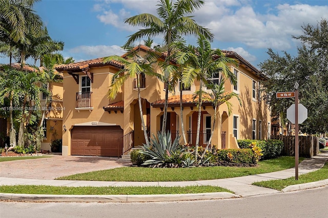 view of front of home with a garage