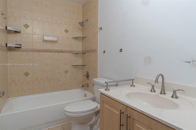 full bathroom with vanity, toilet, tiled shower / bath combo, and tile patterned flooring