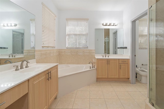 bathroom with vanity, plus walk in shower, a bidet, and tile patterned floors