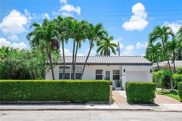 view of front of property with a garage