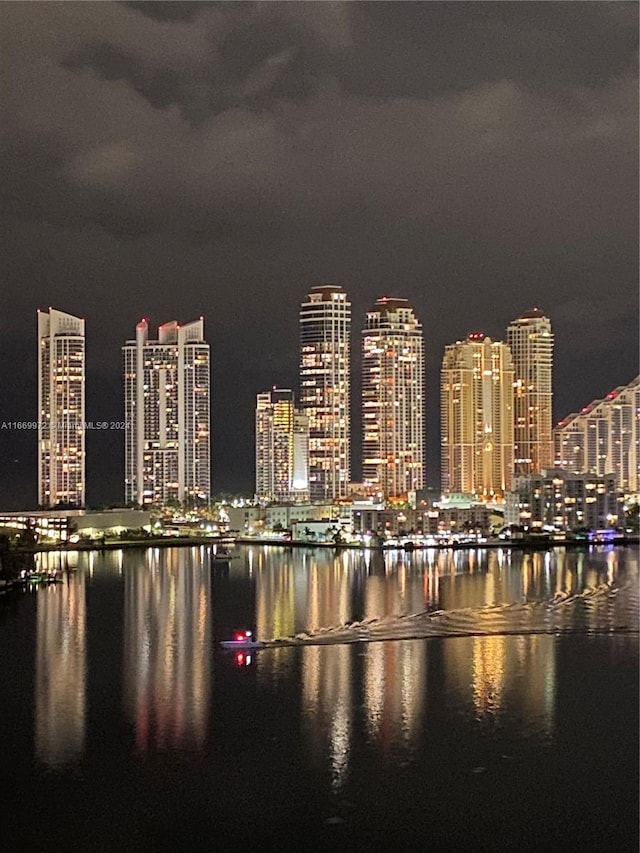 property's view of city featuring a water view