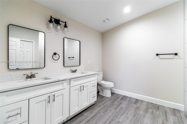 empty room featuring ceiling fan and light hardwood / wood-style flooring