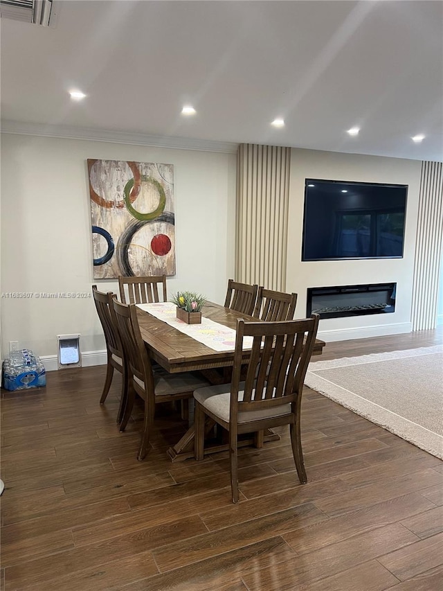 dining area featuring dark hardwood / wood-style flooring