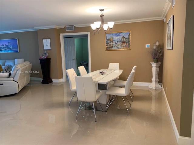 dining space with ornamental molding and a chandelier