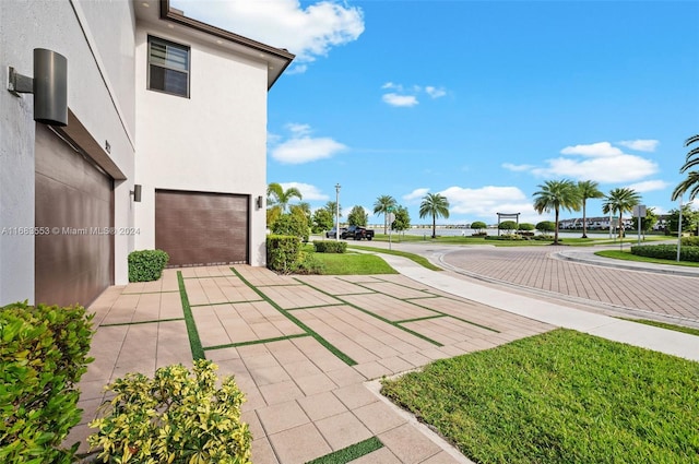 exterior space with a garage