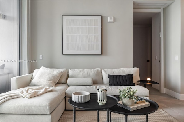 living room featuring tile patterned floors