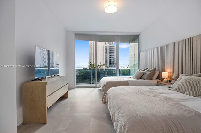 bedroom with a wall of windows