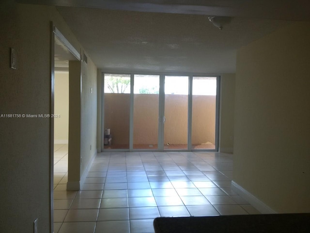 view of tiled spare room