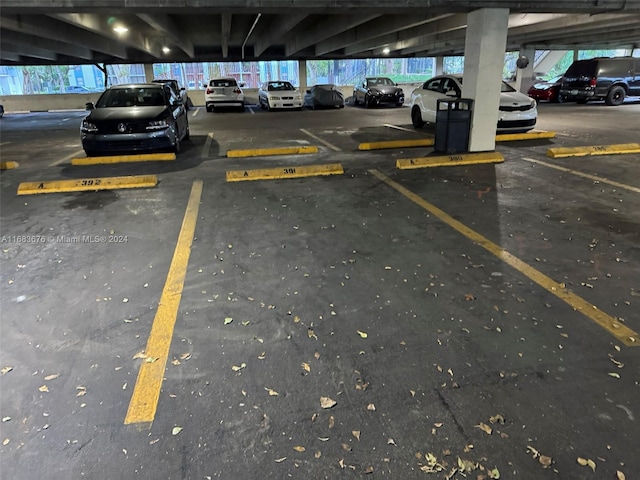 view of parking / parking lot with a carport