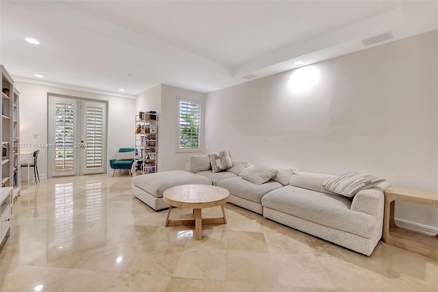 living room with a wealth of natural light and french doors