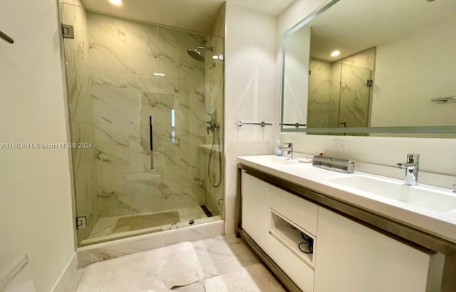 bathroom with vanity, tile patterned floors, and a shower with shower door