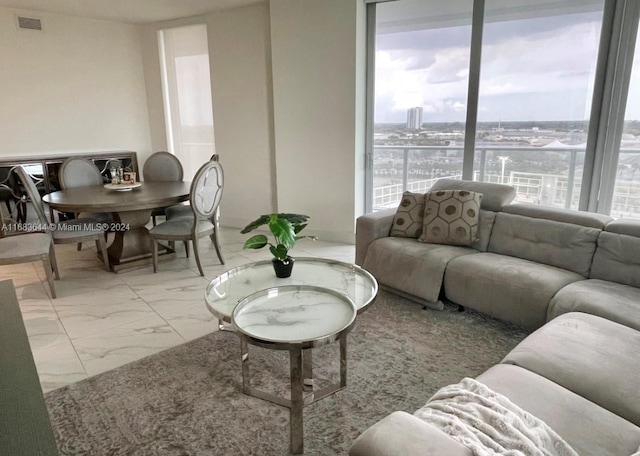 living room featuring expansive windows