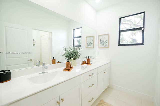 bathroom featuring vanity and tile patterned flooring