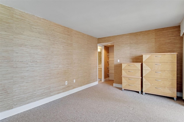 unfurnished bedroom featuring carpet