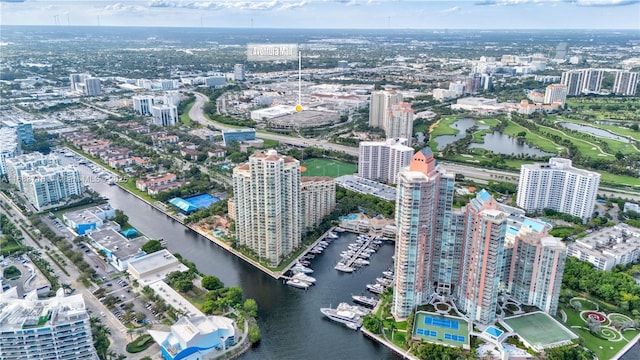 drone / aerial view with a view of city and a water view