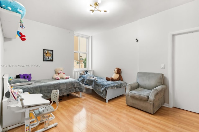 bedroom featuring wood finished floors