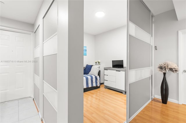 corridor featuring light hardwood / wood-style flooring